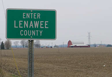 Lenawee County, Michigan, sign post, photograph by Lorelle VanFossen