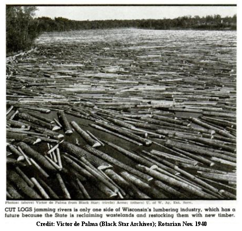 cut log jam on river - wisconsin- taylor rapids - rotarian article 1940