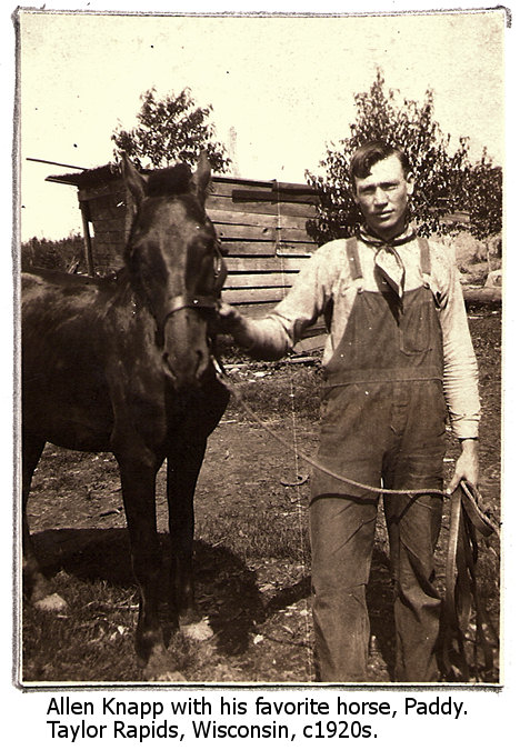 Allen next to horse, Paddy, in Taylor Rapids, Wisconsin, circa 1920