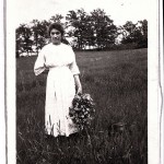 Emma Primely Knapp with fresh cut flowers, Taylor Rapids, Wisconsin, September 3, 1923.