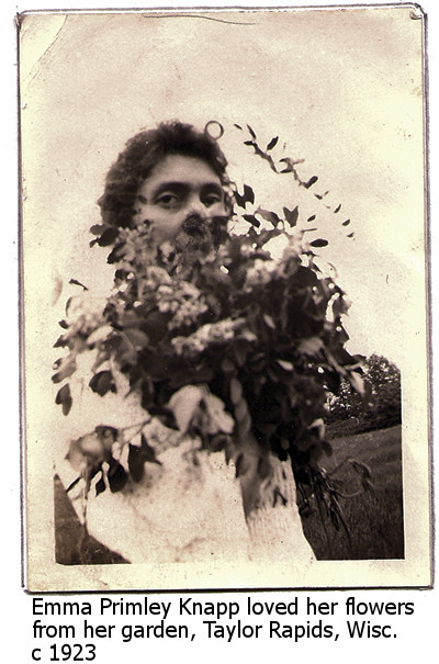 Emma Primely Knapp holding her prized flowers, Taylor Rapids, Wisconsin, September 3, 1923.