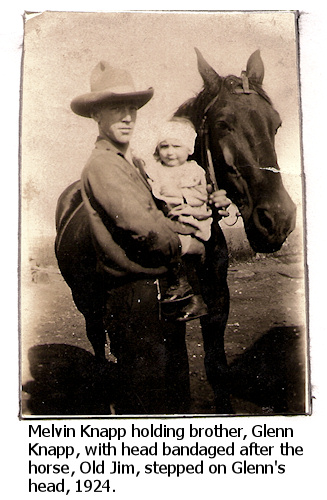 Mevin Knapp holds Glenn Knapp after the horse, Old Jim, stepped on Glenn's head in 1924