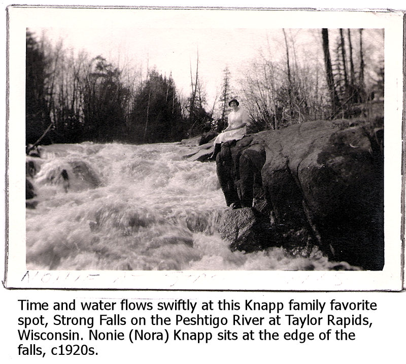 Nora Knapp on rocky edge of Strong Falls at Goodman Park on the Peshtigo River, circa 1920s