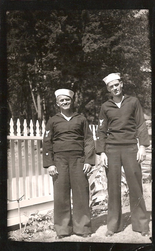 Howard William West Sr posing with unknown fellow in the Coast Guard circa 1940, photograph by Faye Vaughn West.