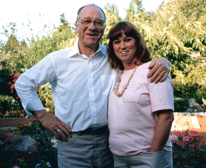 Wayne Knapp and daughter Sharon in garden circa 1980s